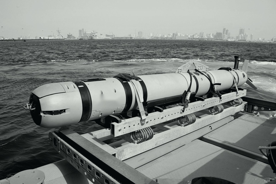 Uncrewed underwater vehicle on deck before deployment, in black and white