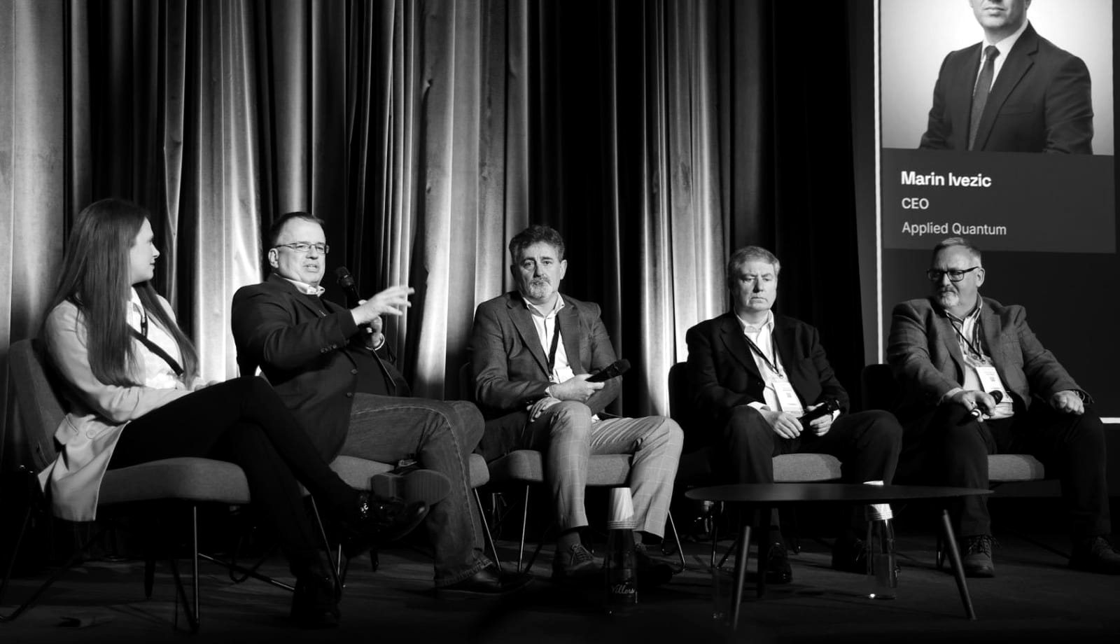 Panellists in discussion at a QSECDEF symposium