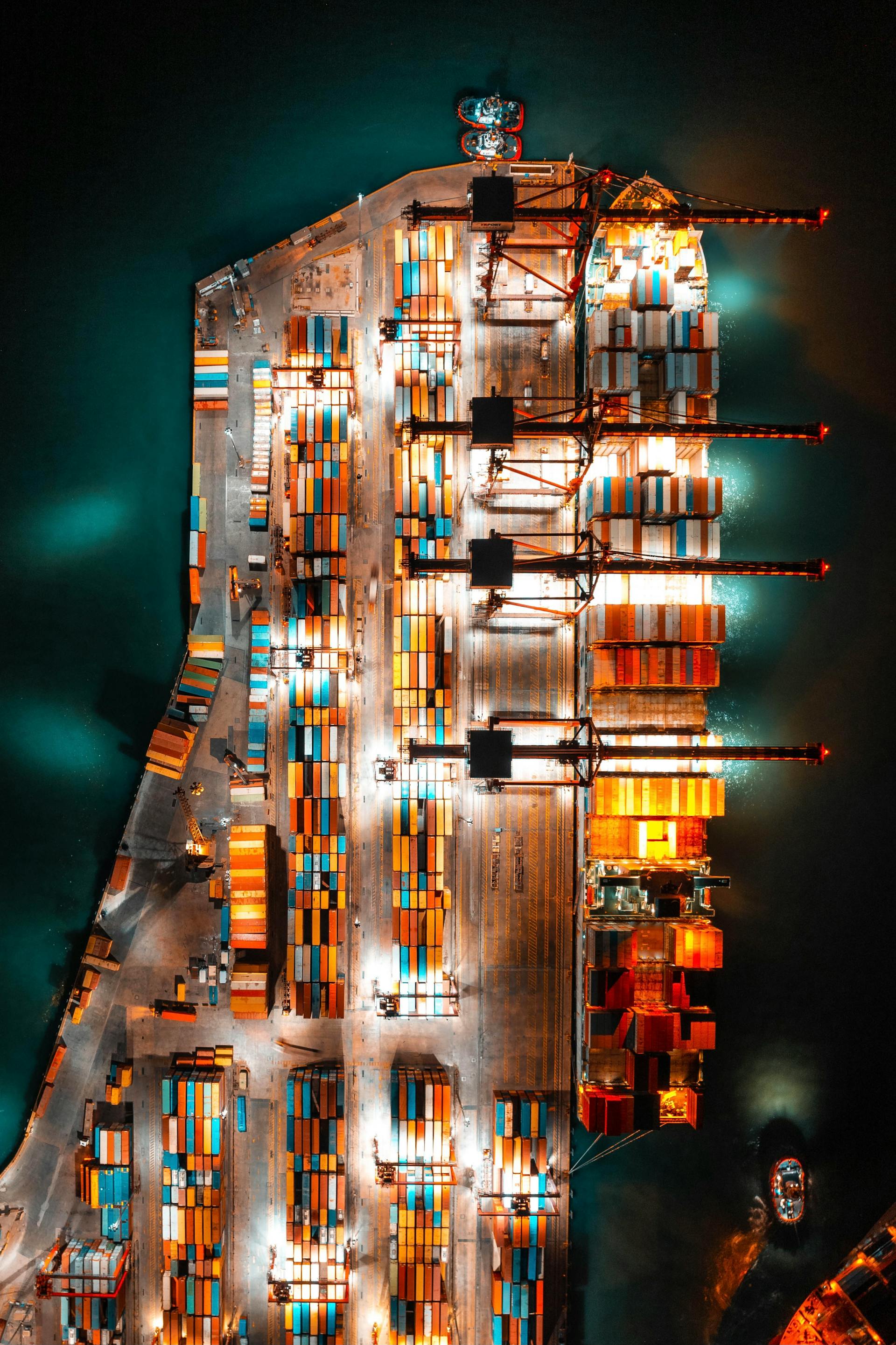 Aerial view of a cargo freighter loaded with shipping containers representing global supply chain operations and third-party logistics dependencies